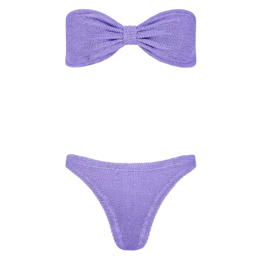 A two-piece bikini set in a textured knit fabric, featuring a strapless bandeau top with a bow detail and matching low-rise bikini bottoms, both in a light lavender purple color, shown against a plain white background.